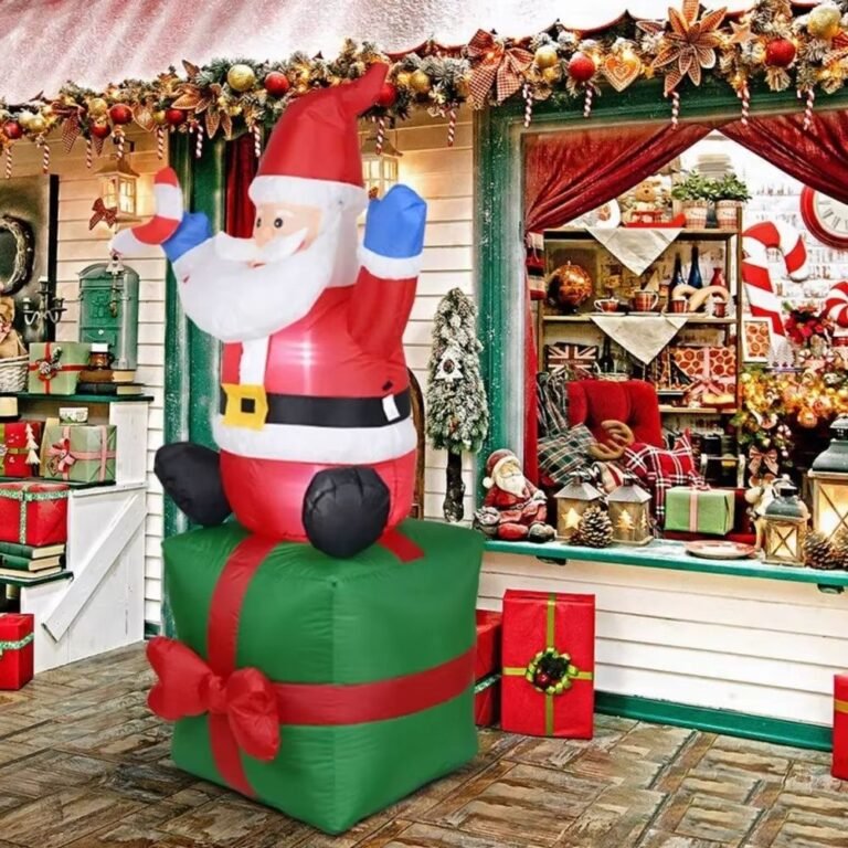Structure De Noel Gonflable Pere Noel Assis Sur Un Cadeau 1