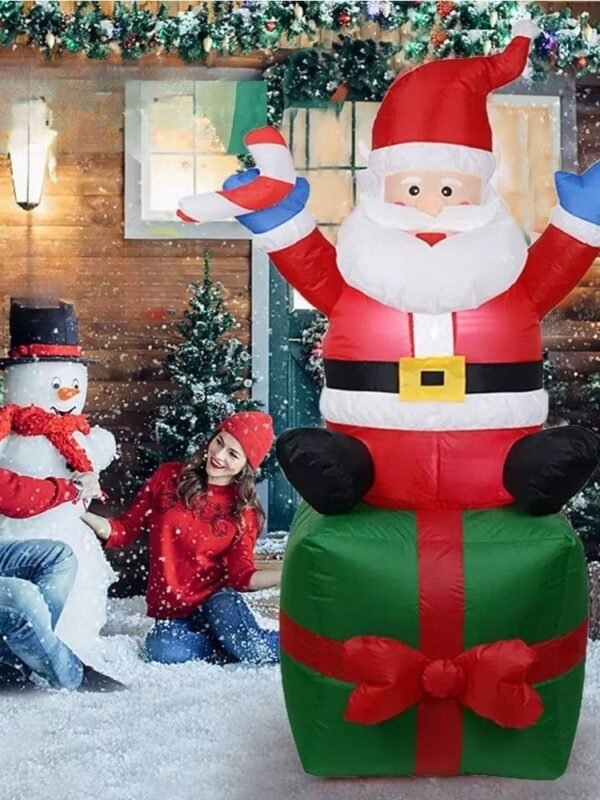 Structure De Noel Gonflable Pere Noel Assis Sur Un Cadeau